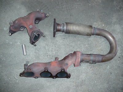 Early cast iron exhaust manifolds.jpg