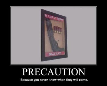 precaution-zombies-12gauge-demotivational-poster.jpg