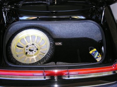 Custom RX8 bored spare tire and CTS belt.jpg